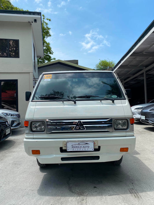 2025 MITSUBISHI	L300 2.2L DSL WITH FB BODY AND DUAL AC MANUAL TRANSMISSION