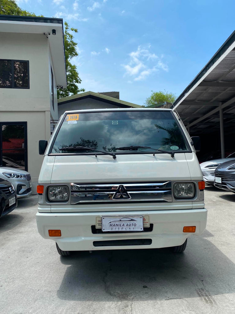 2025 MITSUBISHI	L300 2.2L DSL WITH FB BODY AND DUAL AC MANUAL TRANSMISSION