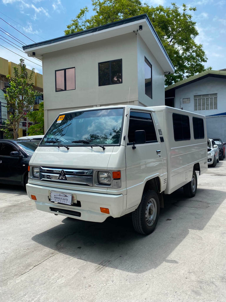 2025 MITSUBISHI	L300 2.2L DSL WITH FB BODY AND DUAL AC MANUAL TRANSMISSION