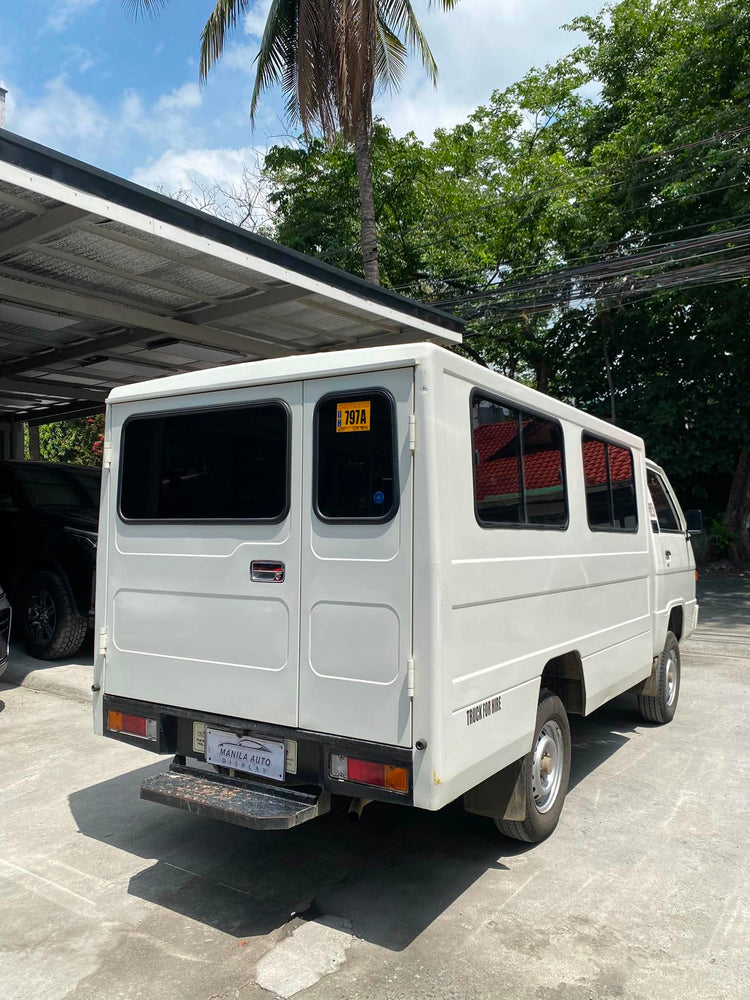 2025 MITSUBISHI	L300 2.2L DSL WITH FB BODY AND DUAL AC MANUAL TRANSMISSION